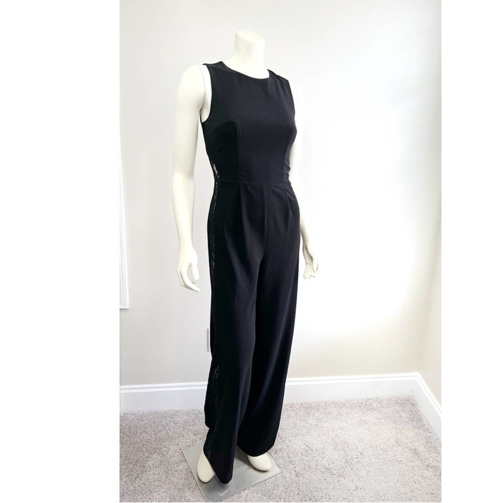 bebe black jumpsuit Size: 2